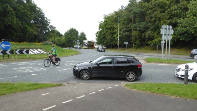 Cyclist riding on the Sniperley roundabout