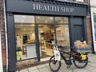 Cargo bike standing in front of the Health Food Shop, Langley Moor